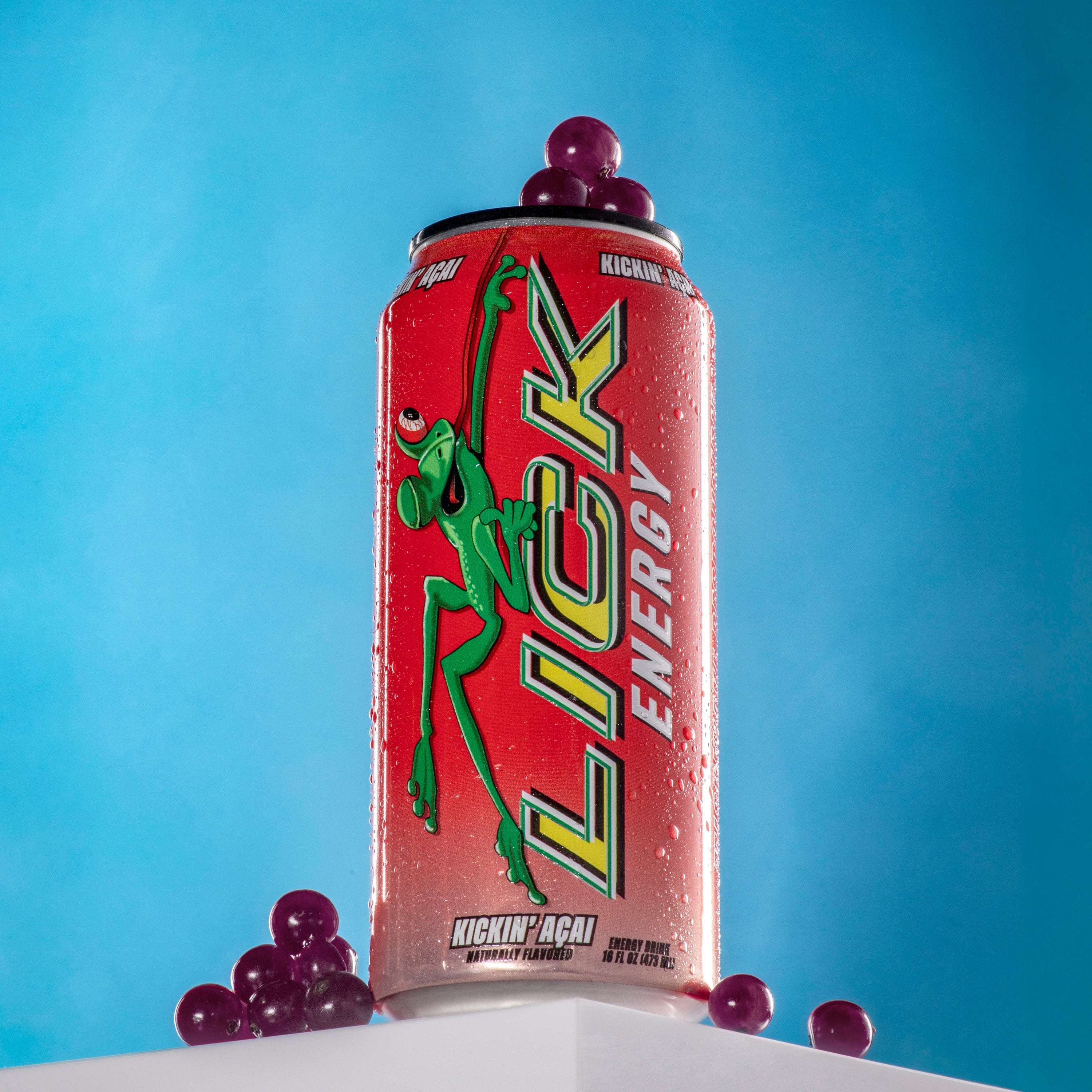 LICK Energy drink can with red label and green frog on a blue background